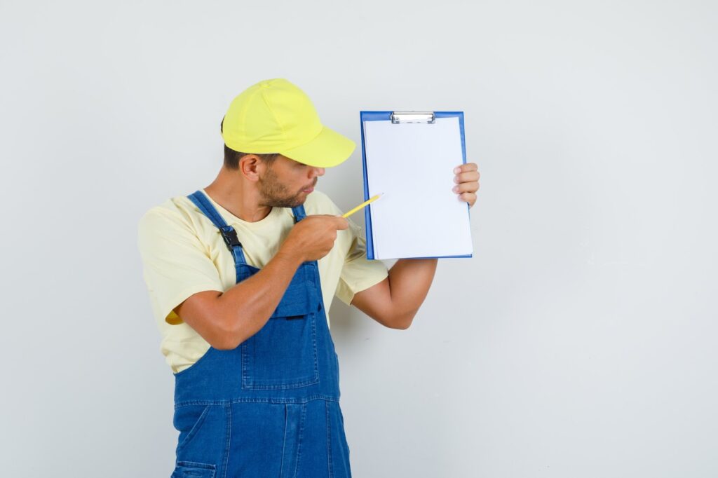 An electrician with a call rates file