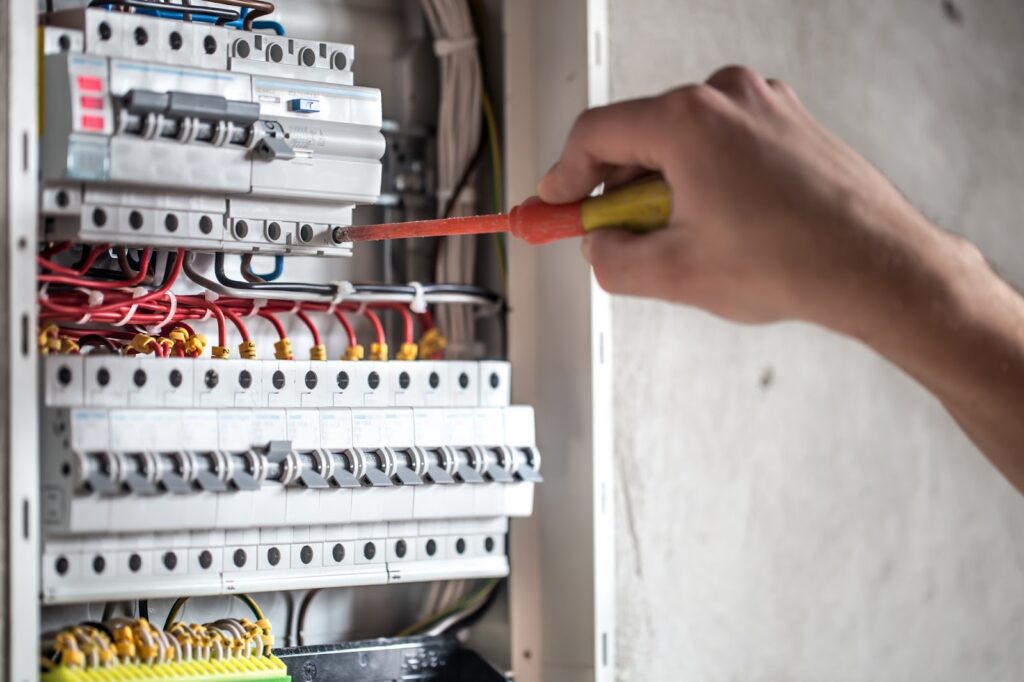 An electrician fixing a tripping circuit